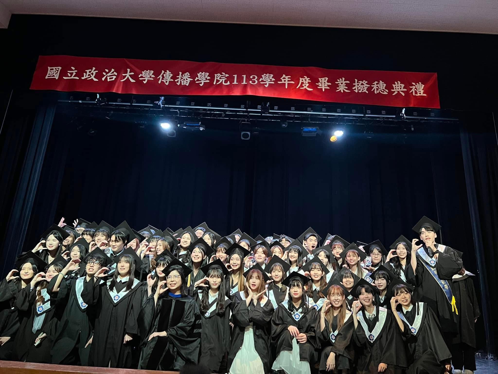 Director Yuhmiin Chang of the Department of Advertising with graduates.