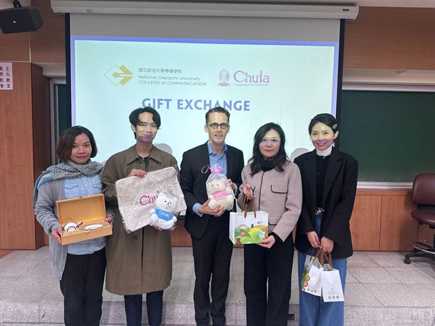 Faculty and staff from NCCU and Chulalongkorn University (CU) participate in a gift exchange to commemorate the long-standing collaboration between the two institutions.  From left to right: Karnchana
